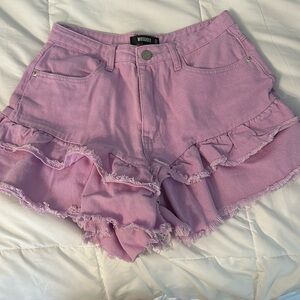 Purple denim shorts with ruffles